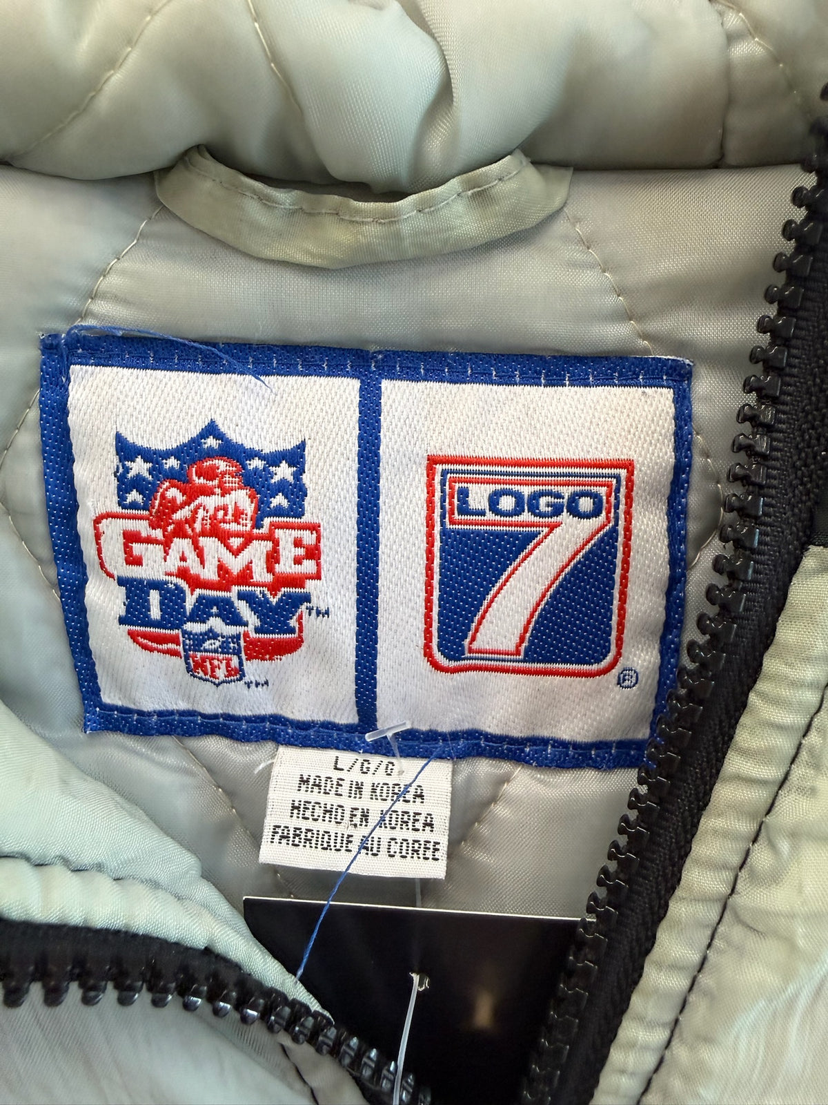 (L) Oakland Raidsrs Logo 7 Puffer Jacket