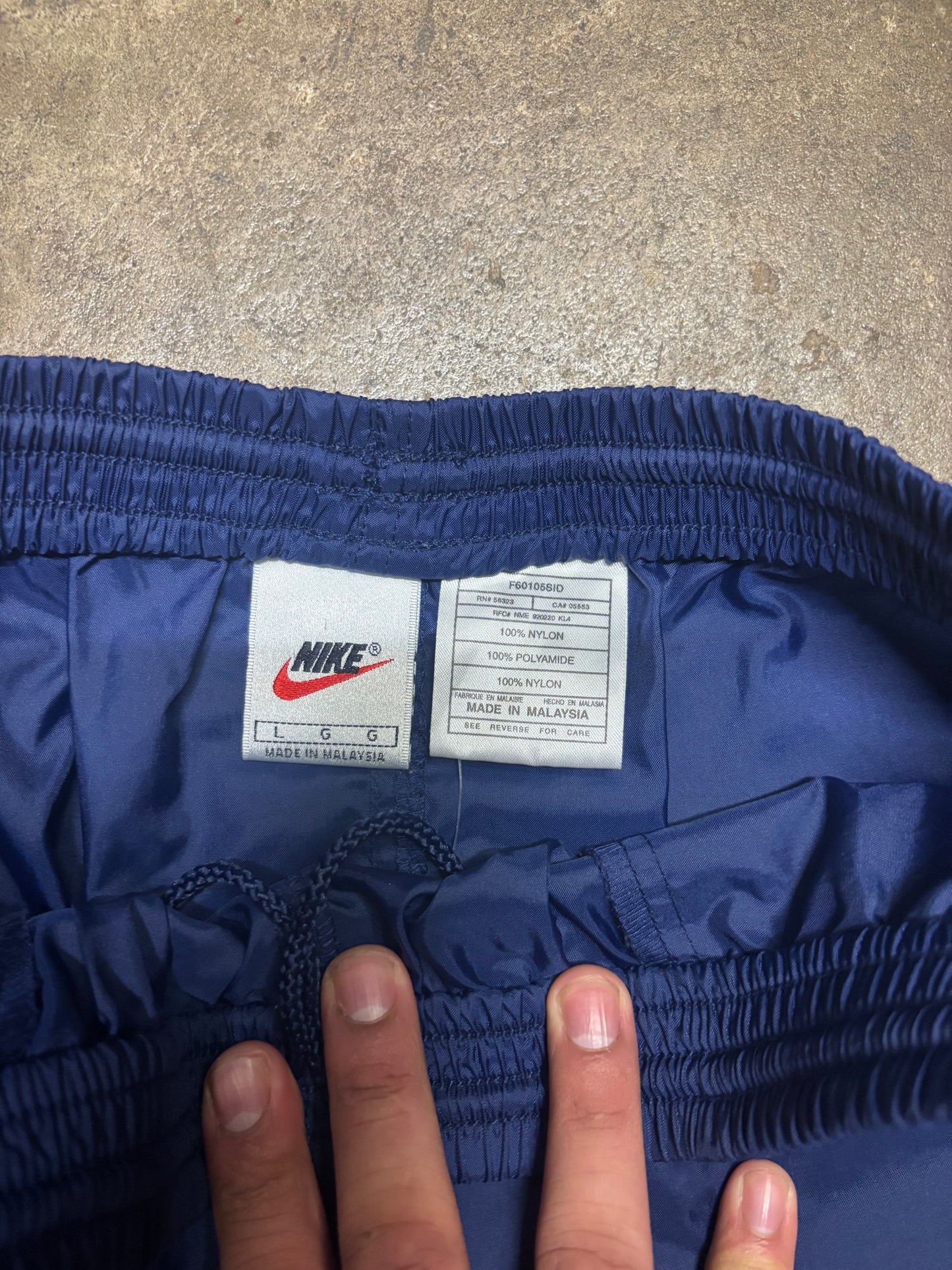 (34x31) Vintage 90s Nike Navy Cuffed Track Pants